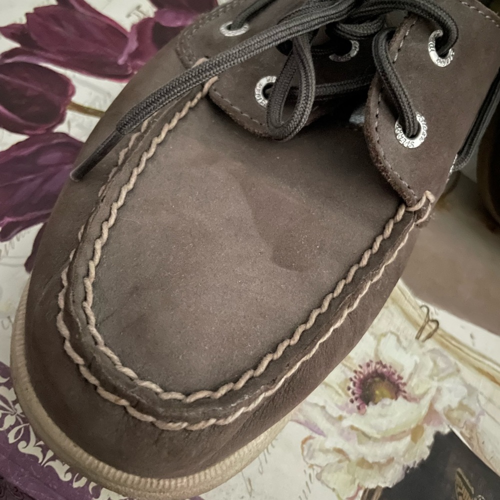 Brown and silver sperrys